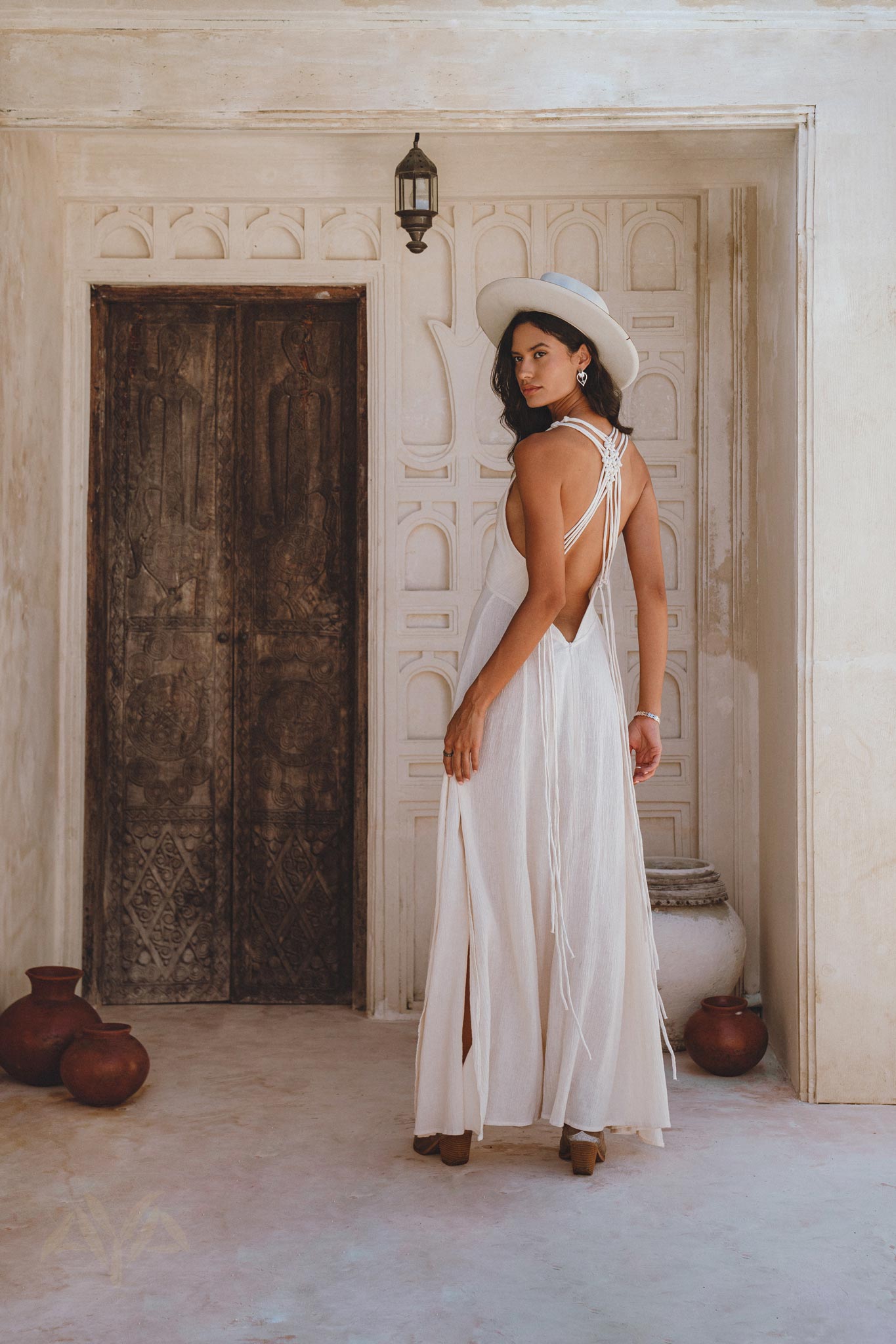 Stylish everyday dress featuring an open neckline and decorative slits on the breasts. Off-white and made with organic linen-cotton in a special dye process