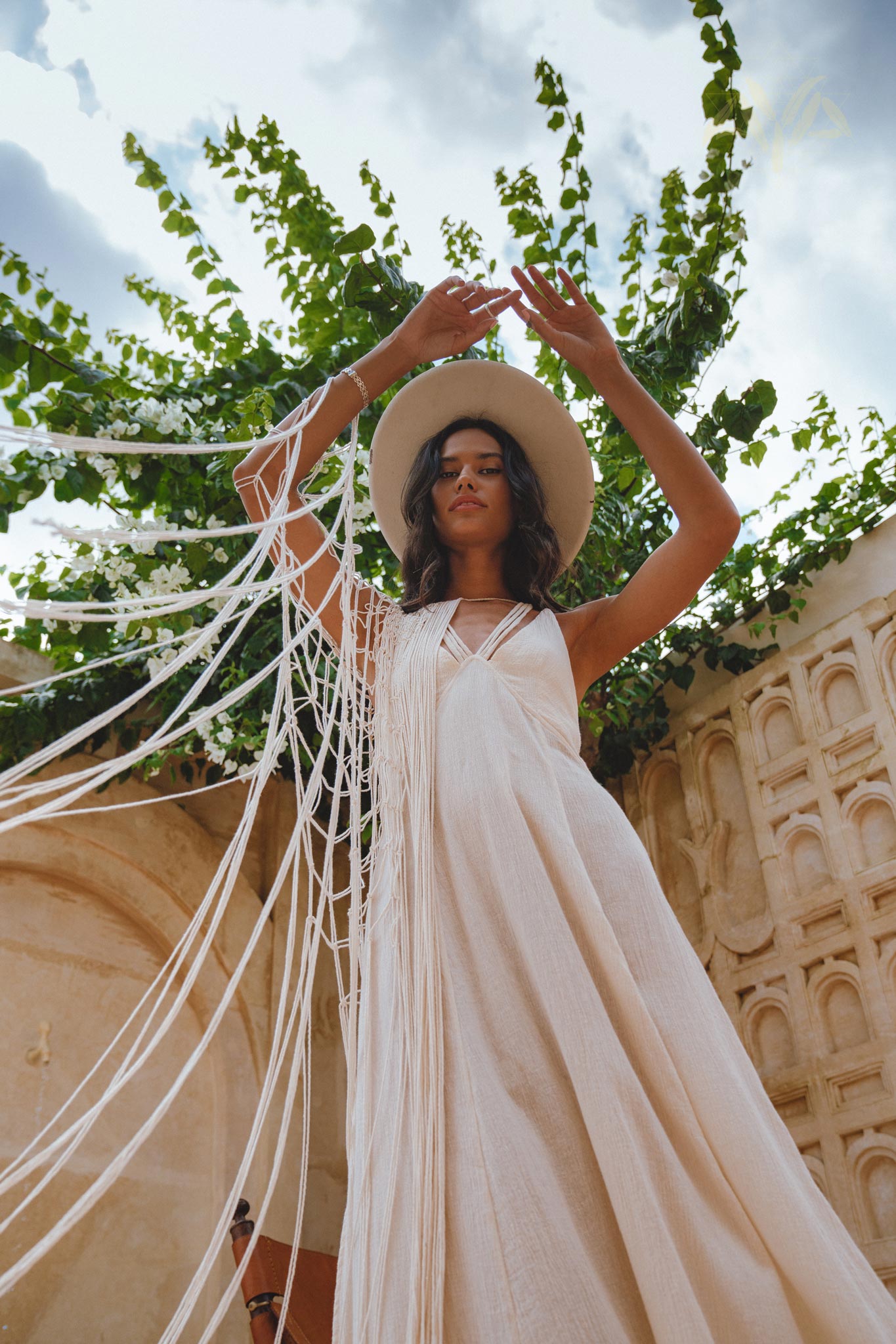 Off-White Low Back Slit Dress with handmade macramé design. Adjustable straps enhance the sensual and decorative look. Made with 50% Linen, 50% Cotton.
