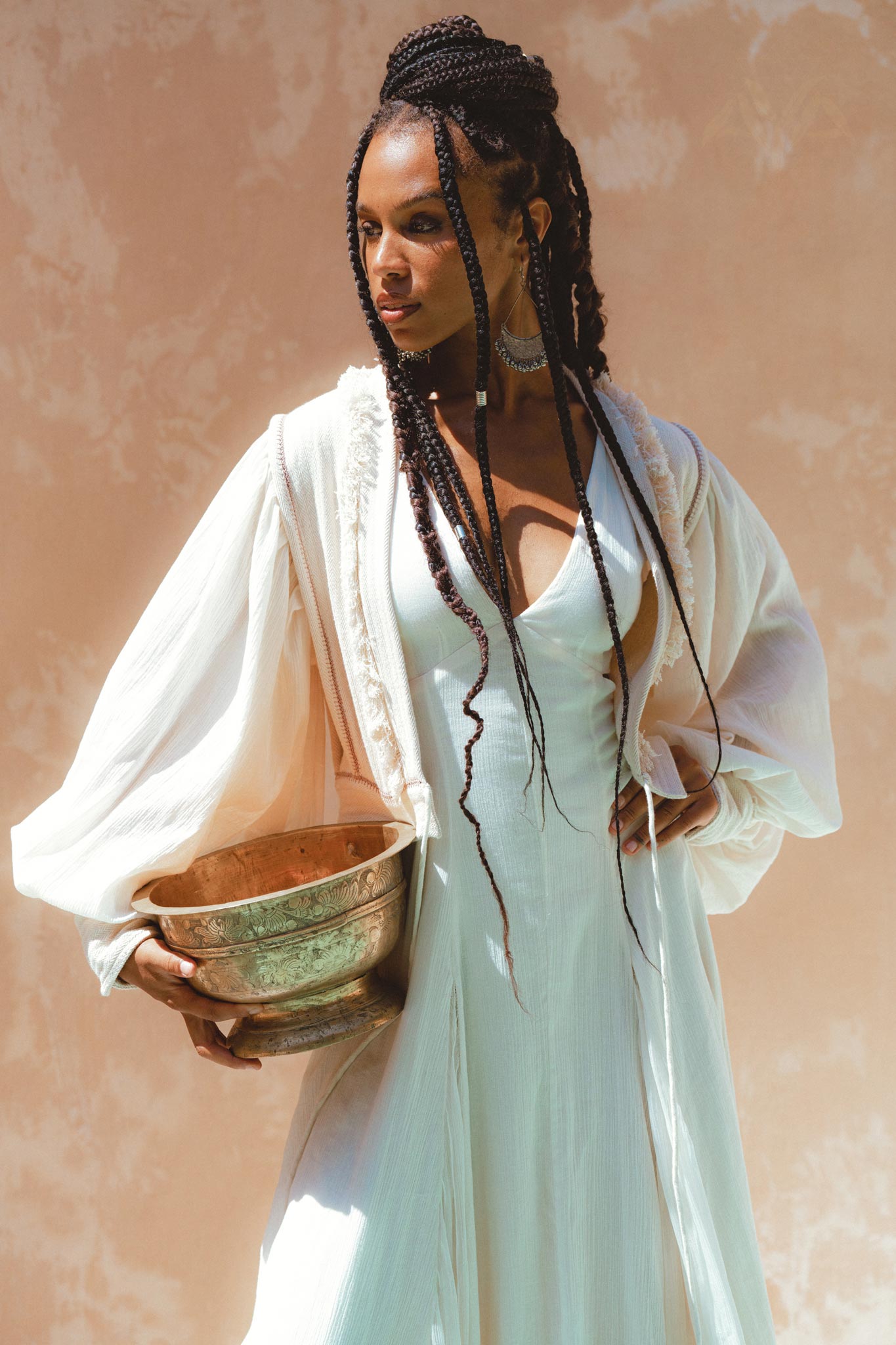 Add a touch of elegance to your wardrobe with Aya Sacred Wear's Off-White Puff Sleeved Top! 