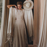 Make a statement with a unique ombre sage green shawl from Aya Sacred Wear.