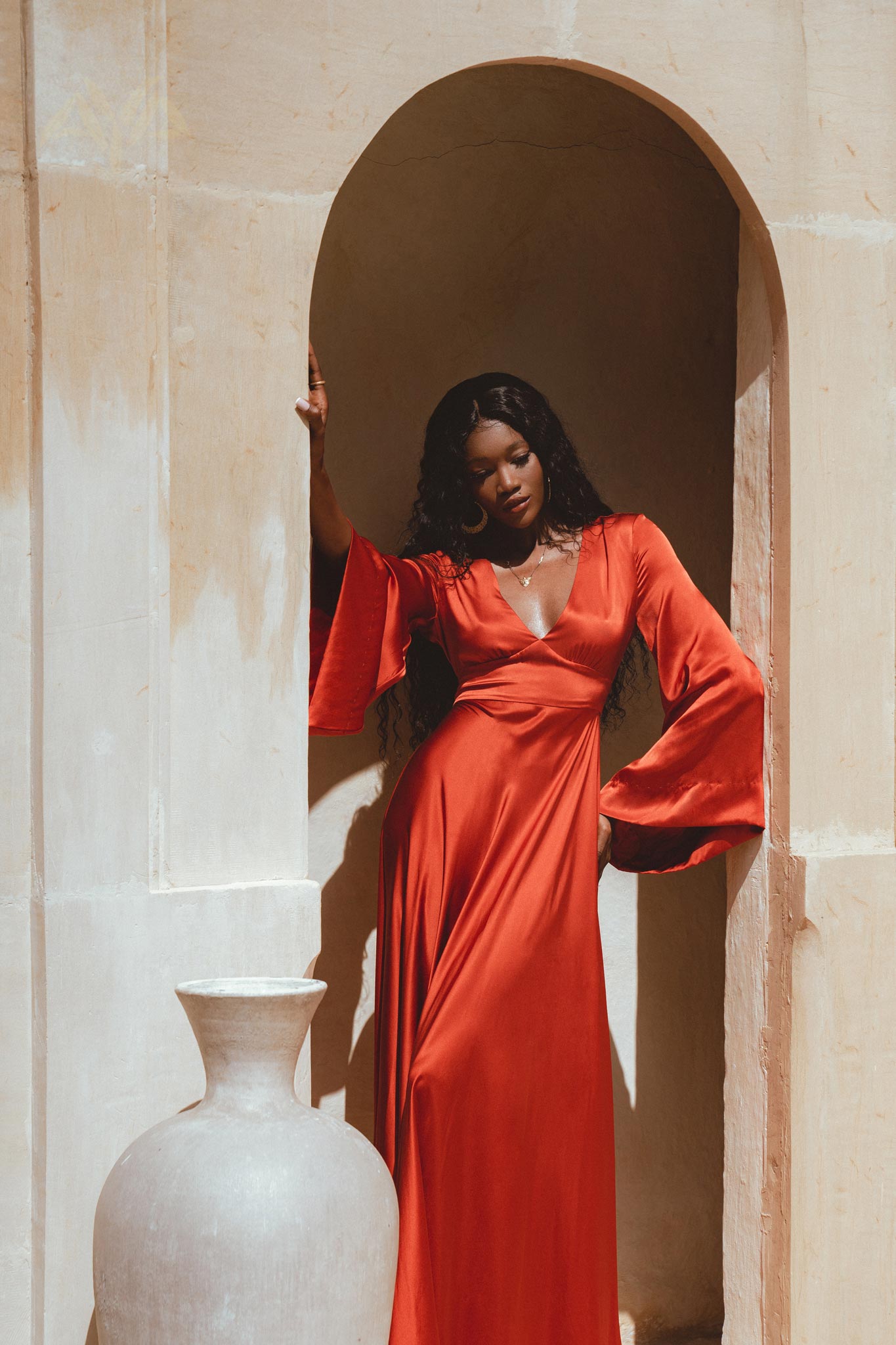 Elegant Feminine Ivory Wedding Dress - Bohemian Style with Empress Waist design and Bell Sleeves.