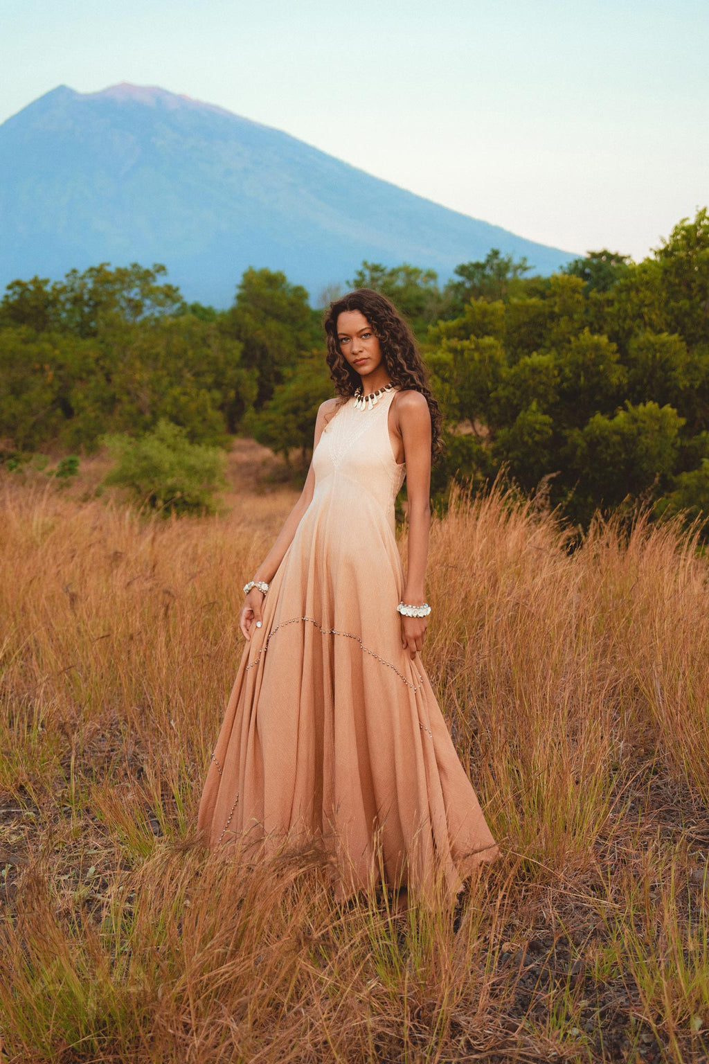 Show off your style with the modern and chic Ombré Pink Minimalist Dress from aya sacred wear.