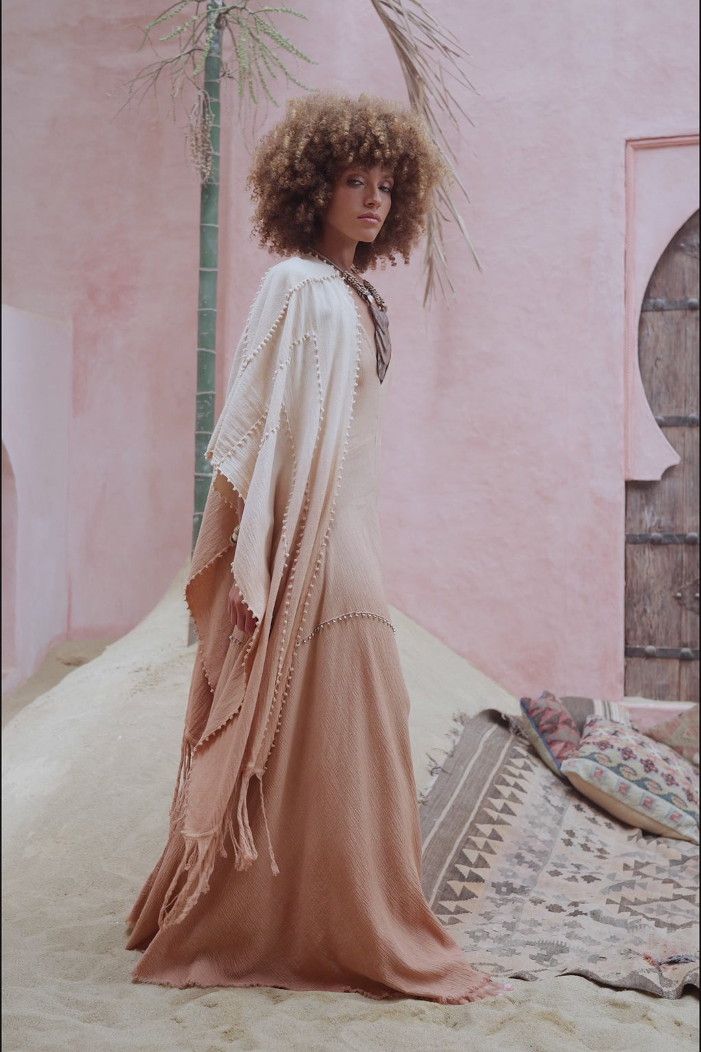 Step out in style with Aya Sacred Wear's Powder Pink Poncho Robe.