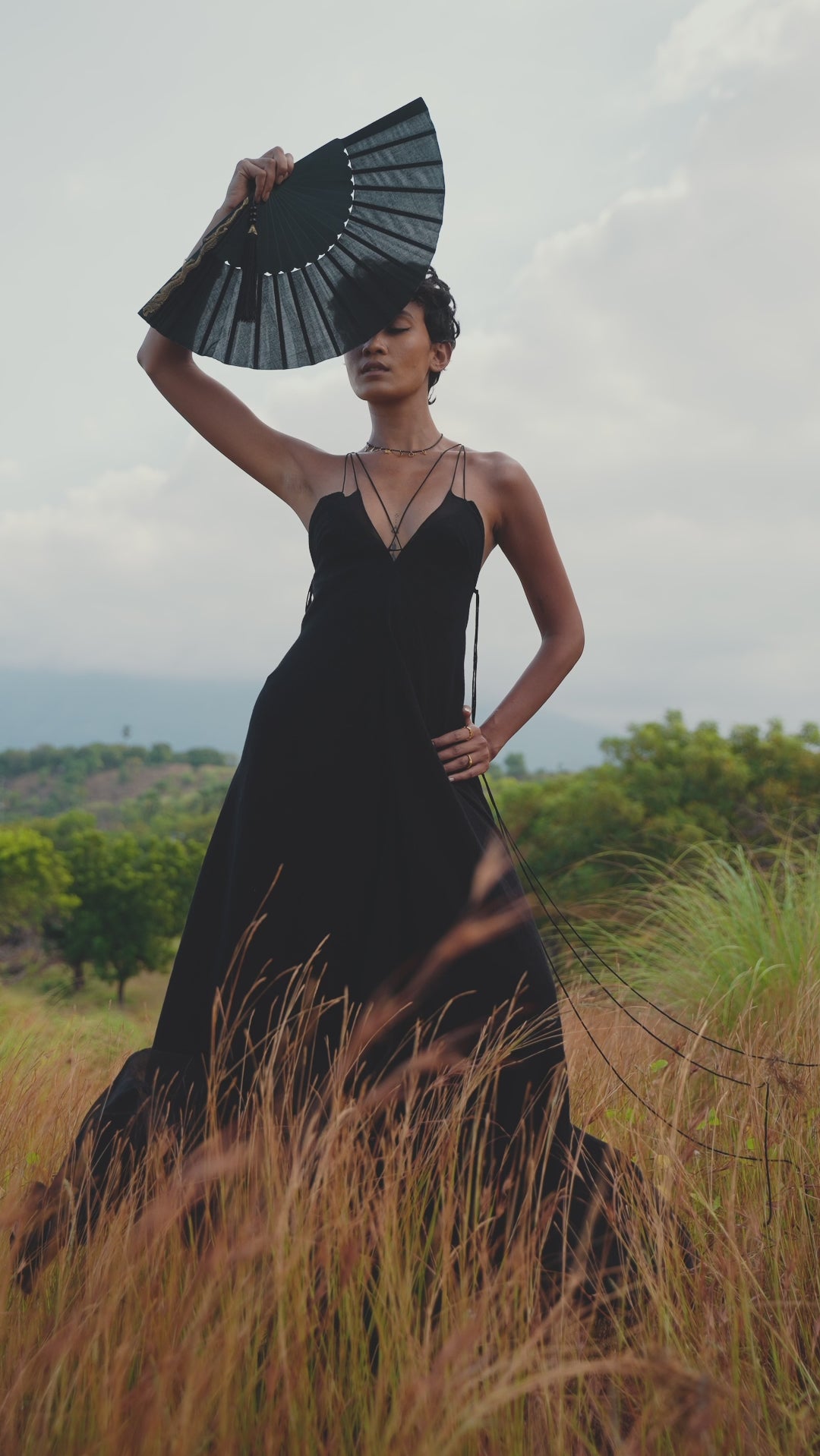 Explore the Black Goddess Dress - a boho cocktail summer must-have. Features Bohemian backless design with handmade laces for an elegant look.