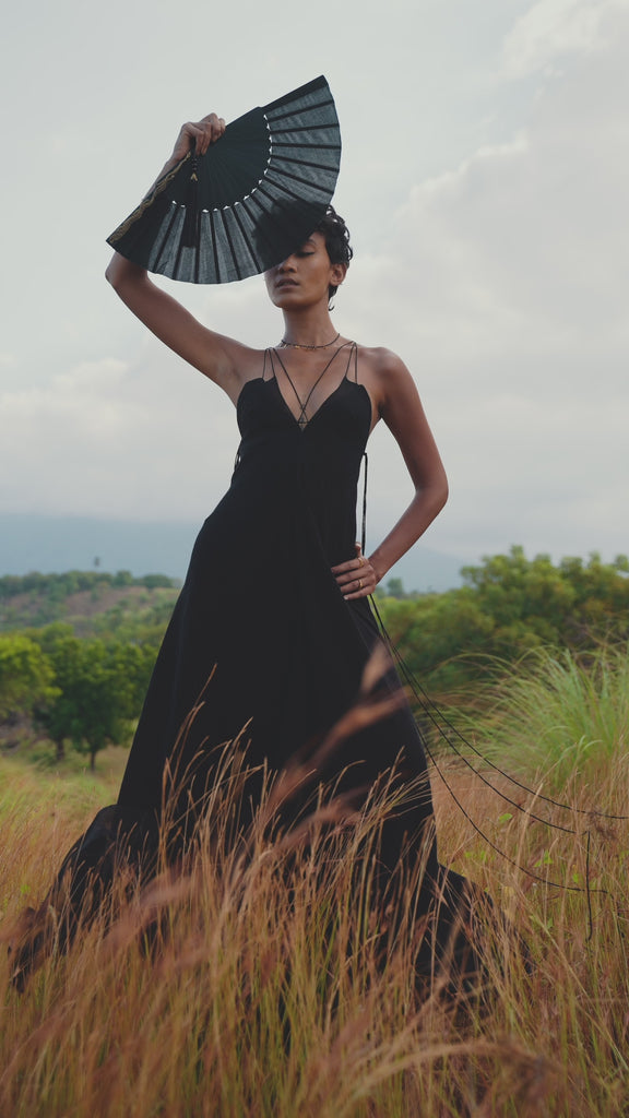 Explore the Black Goddess Dress - a boho cocktail summer must-have. Features Bohemian backless design with handmade laces for an elegant look.