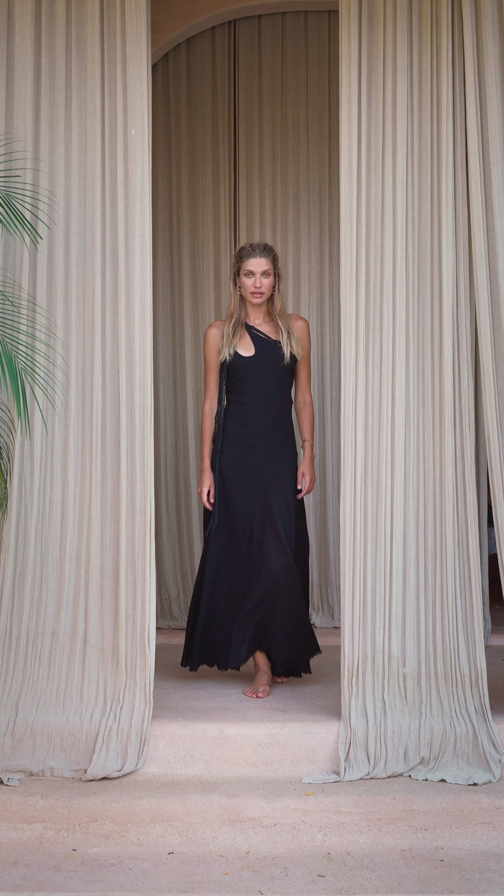 Update Your Wardrobe with the Latest from Aya Sacred Wear - Black Open Side Dress