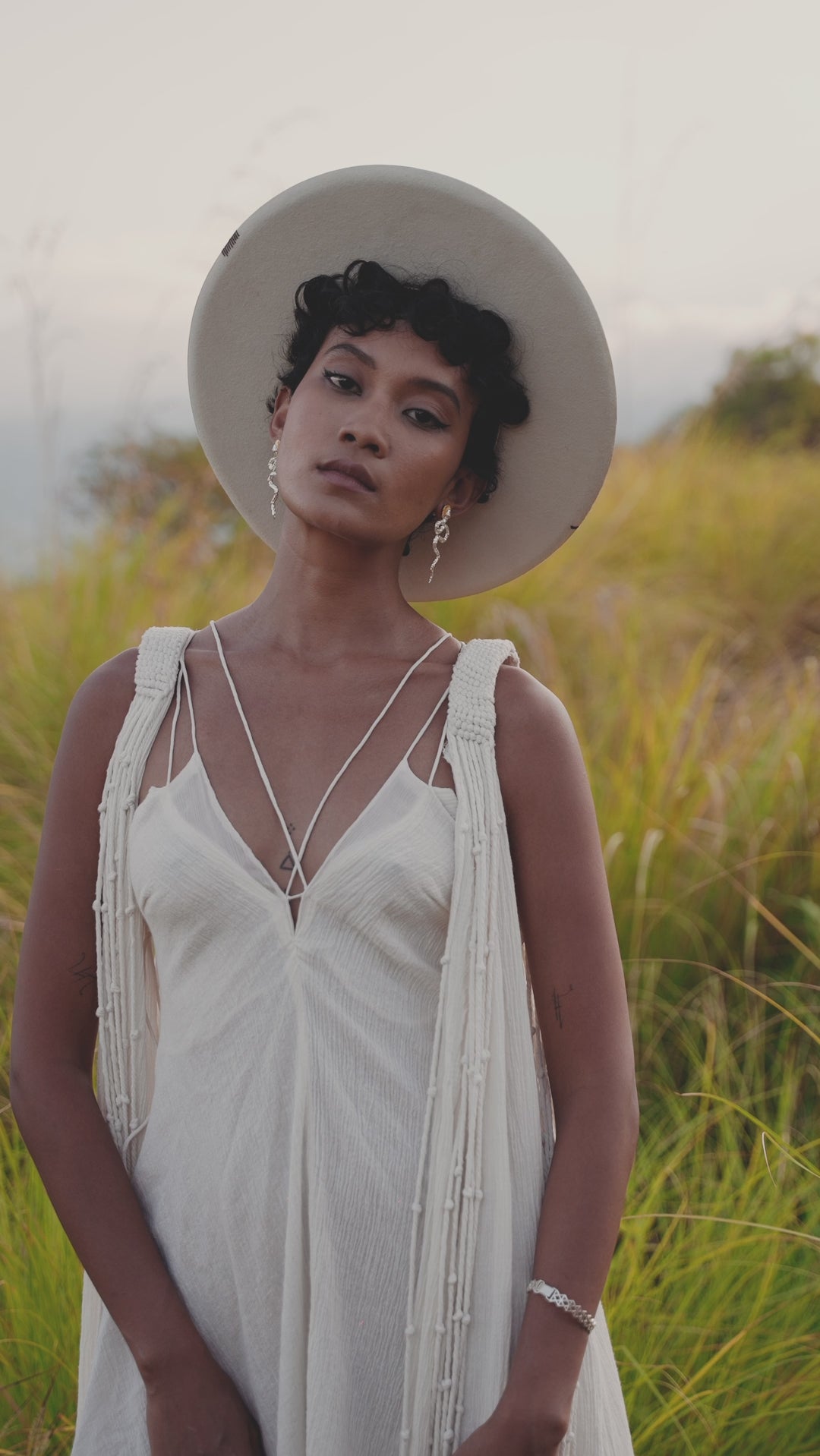 Be the envy of all the gods in the Off-White Greek Goddess Cape Dress from Aya Sacred Wear.