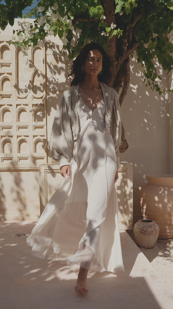 Dusty Blue Puff Sleeves Top with hand embroidery by local artisans, made from organic structured linen and featherweight sleeve.