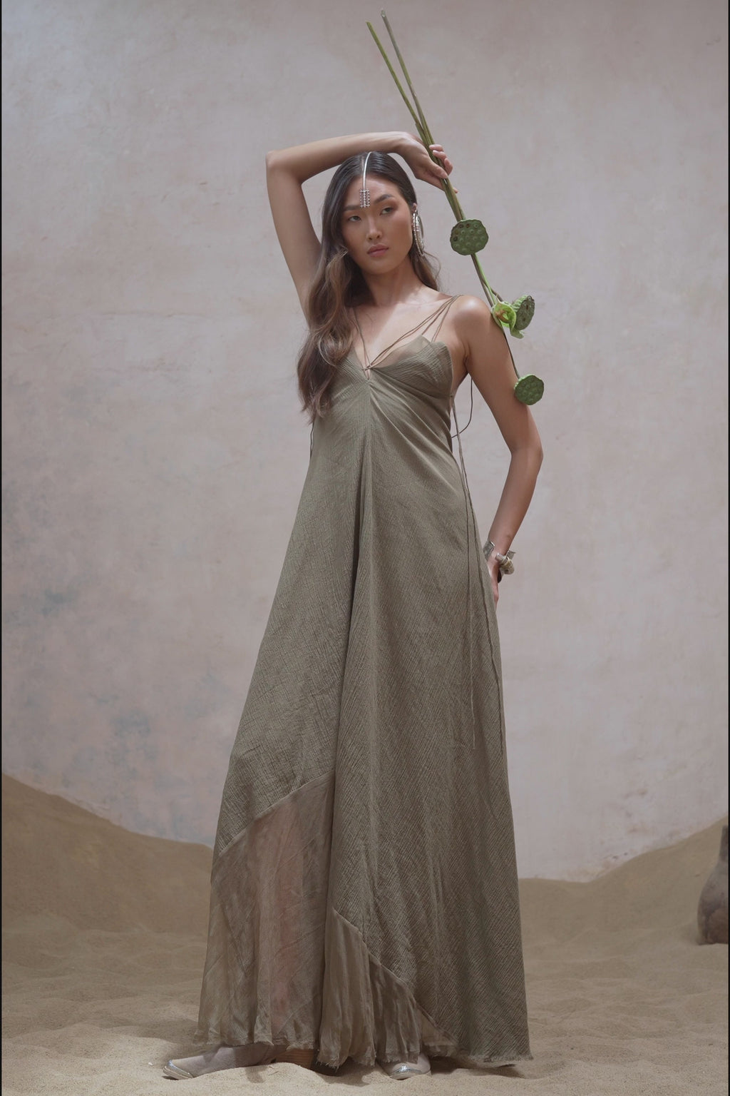 Get ready to shine with the Sage Green Goddess Dress from Aya Sacred Wear. Feel divine in this handmade dress and show off your inner goddess.