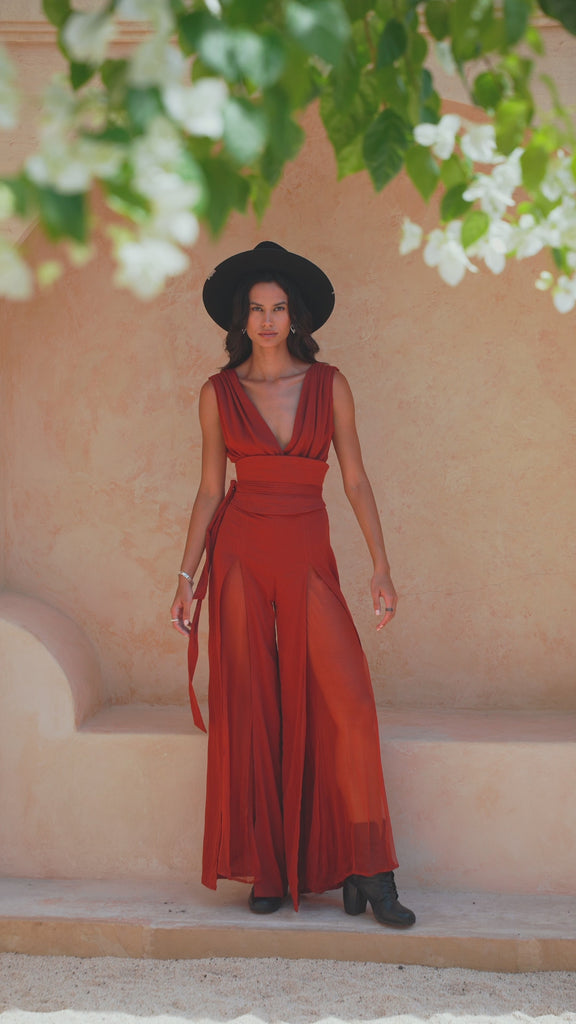 Bohemian sexy overall meets eco chic in our Red Wine Goddess Jumpsuit. With curvy wide legs & a silk belt corset, it's the perfect balance of casual and formal for any event or occasion.