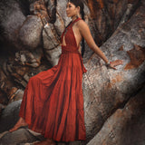Turn heads at your next event in this show-stopping red bohemian prom dress