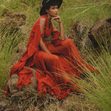 A whimsical choice for a wedding guest, this red wine boho dress adds a touch of enchantment.