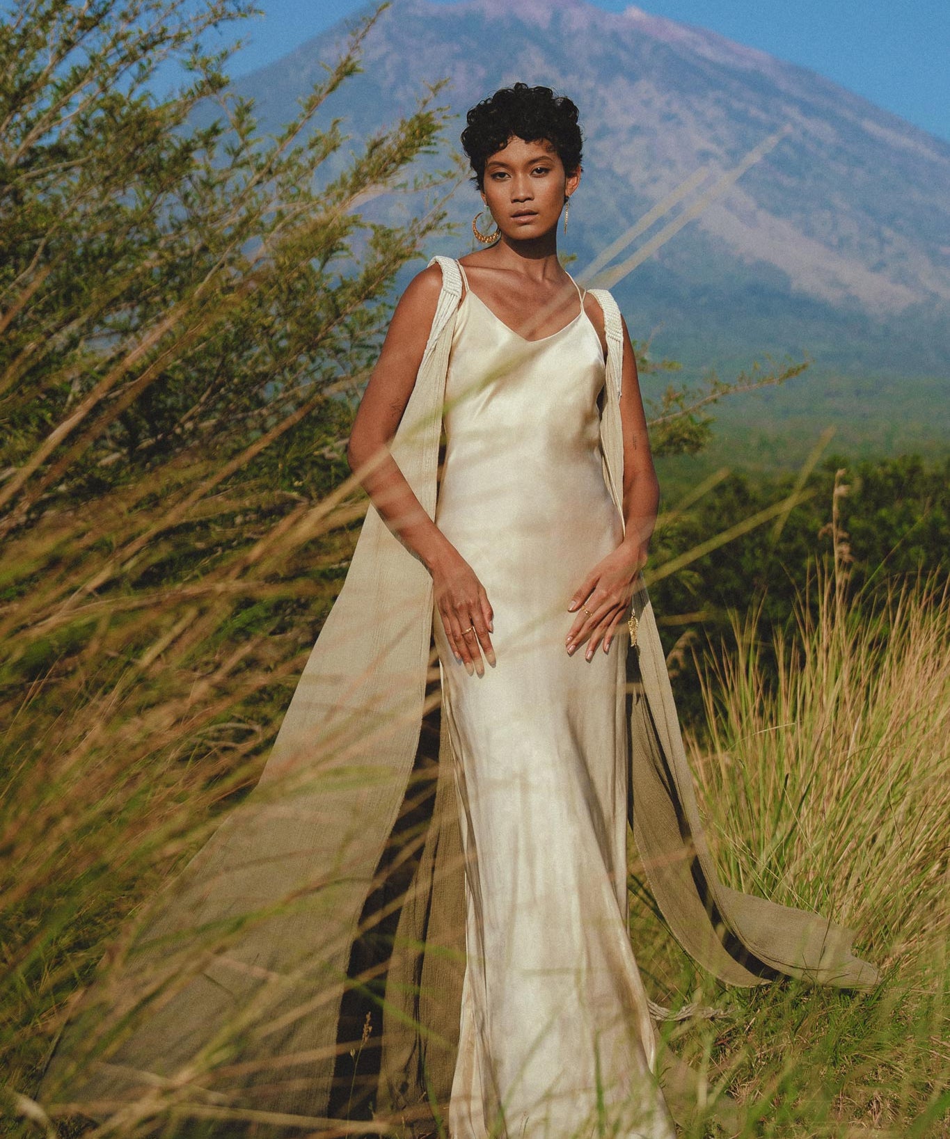 Add a touch of sophistication to your wardrobe with this Sage Green Macrame Cape by Aya Sacred Wear.