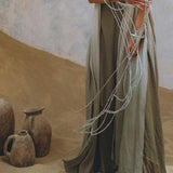 Stand out from the crowd with this gorgeous Macrame Cape by Aya Sacred Wear. 