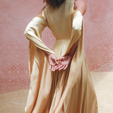Look Regal in Aya Sacred Wear's Silk Powder Pink Goddess Wrap Dress.