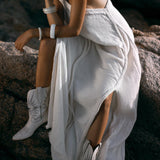 Off-White Aurora Greek Goddess Dress: Unleash your inner goddess with our ethereal off-white Aurora dress. Crafted from luxurious organic cotton, its flowing silhouette and one-shoulder design exude effortless elegance.