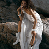 Elegant Off-White Toga Dress: Step into sophistication with our elegant off-white toga dress. Handmade from premium organic cotton, its draped silhouette and one-shoulder detail exude refined glamour.