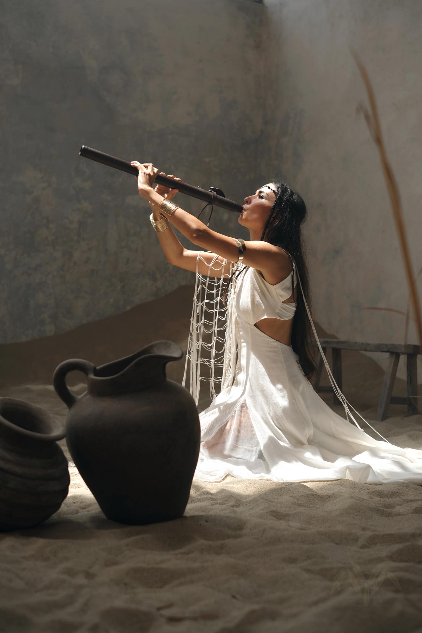 Boho-Style Net Cover Up - Embrace your bohemian side with this beautiful off-white poncho cape, a must-have for any fashion-forward woman.