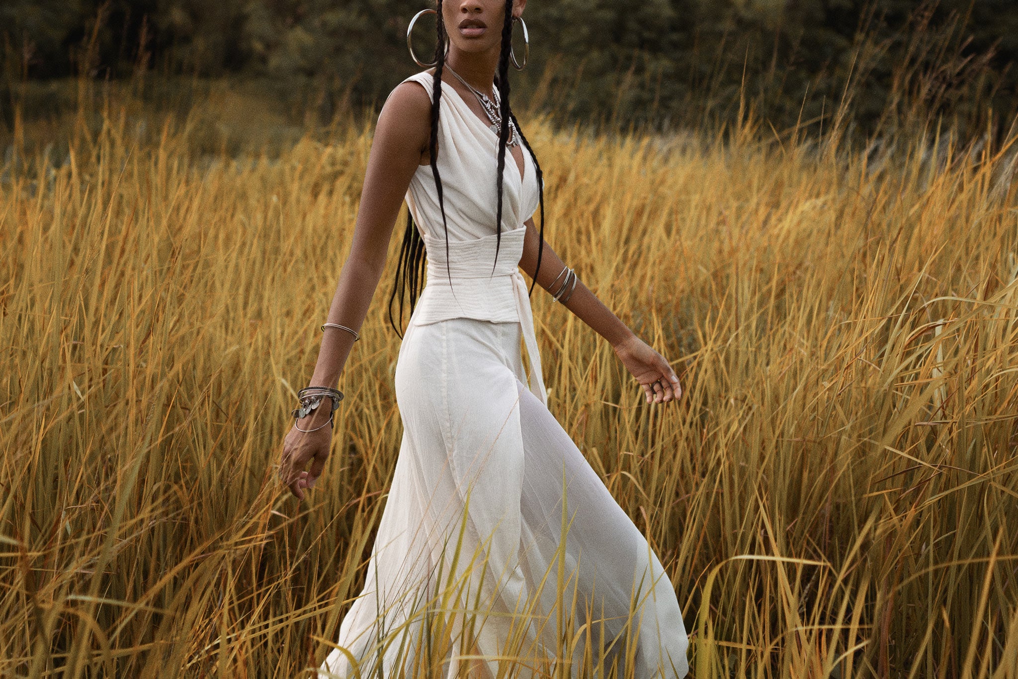 A stunning Off White boho jumpsuit for women, created with exquisite silk and cotton.