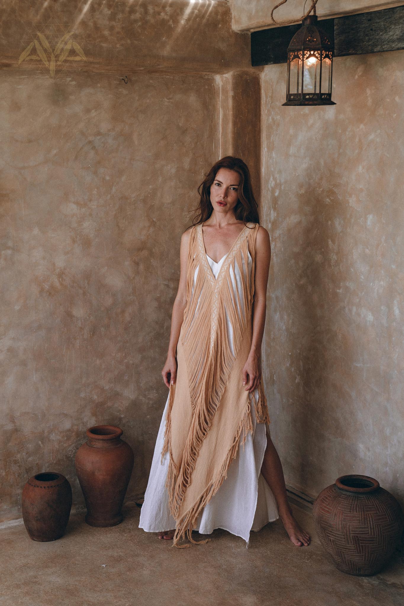 Boho beige ochre dress hand-woven and hand-loomed with intricate embroidery and tassel border.