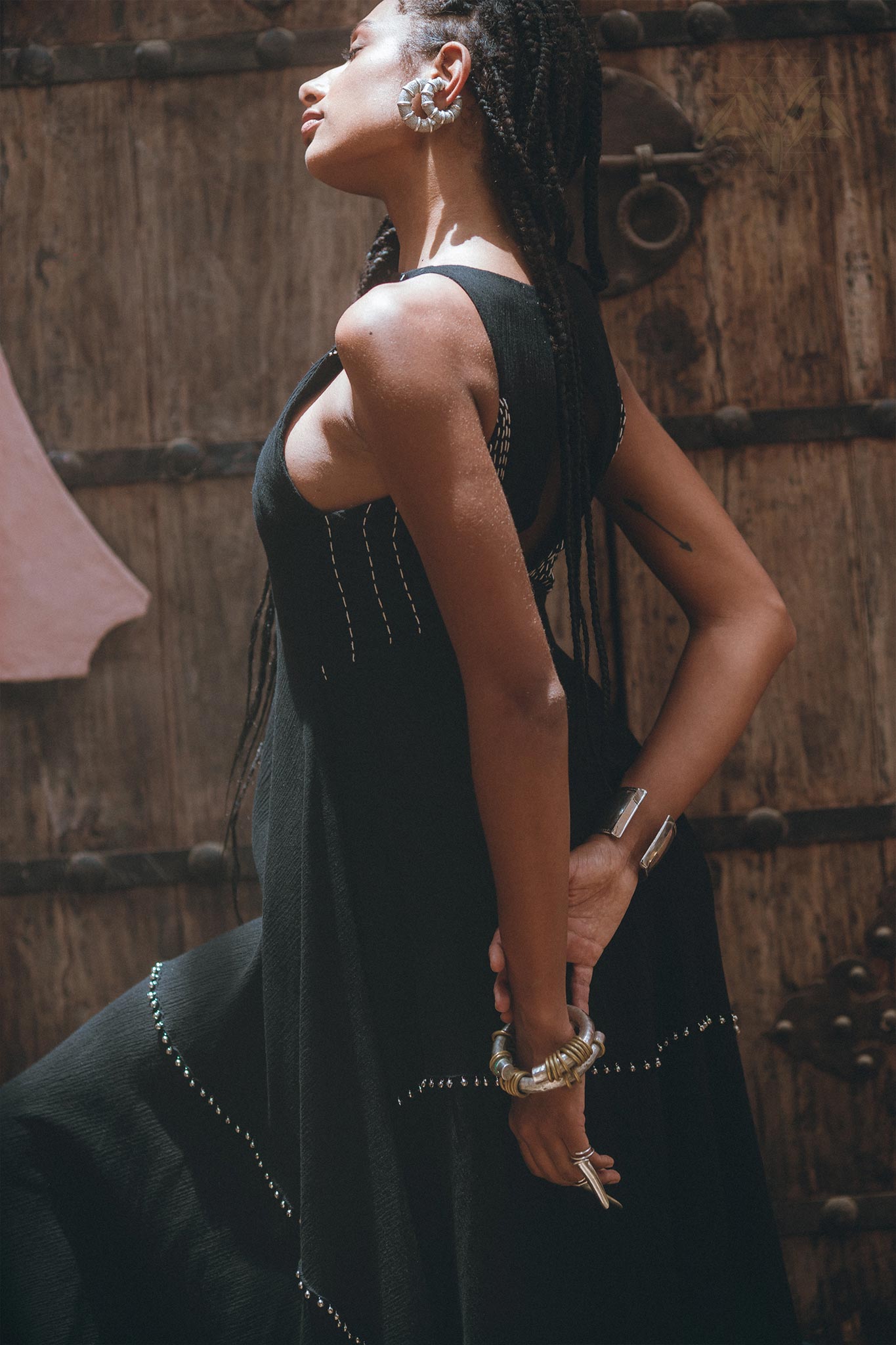 Look your best in a sleek, stylish black minimalist cocktail dress by Aya Sacred Wear.