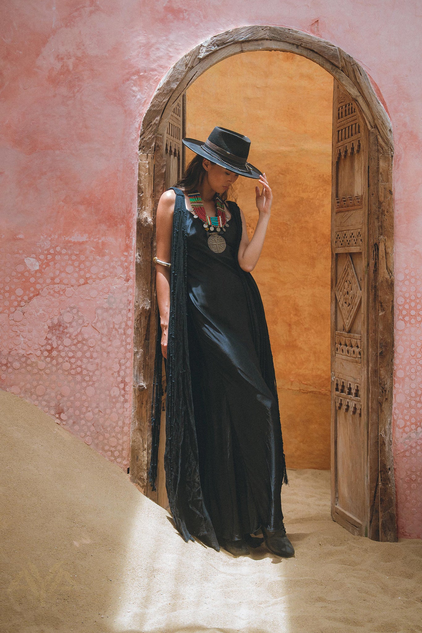 Show off your goddess vibes with this exquisite black cape dress from Aya Sacred Wear.