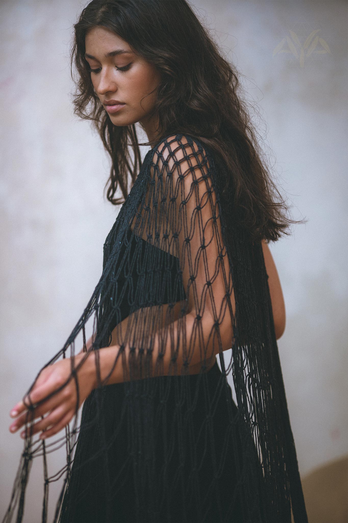 Look effortlessly stylish with Aya Sacred Wear's Black Summer Cover Up. 