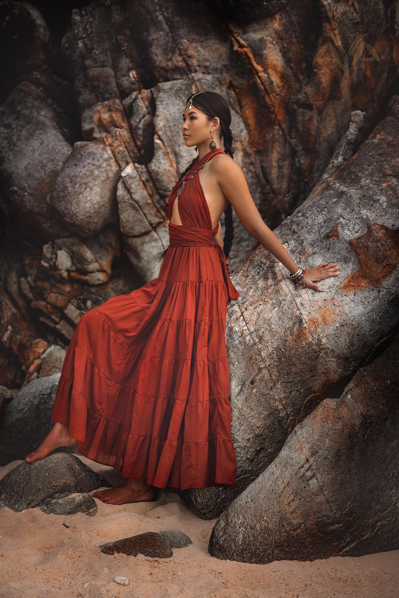 Turn heads at your next event in this show-stopping red bohemian prom dress