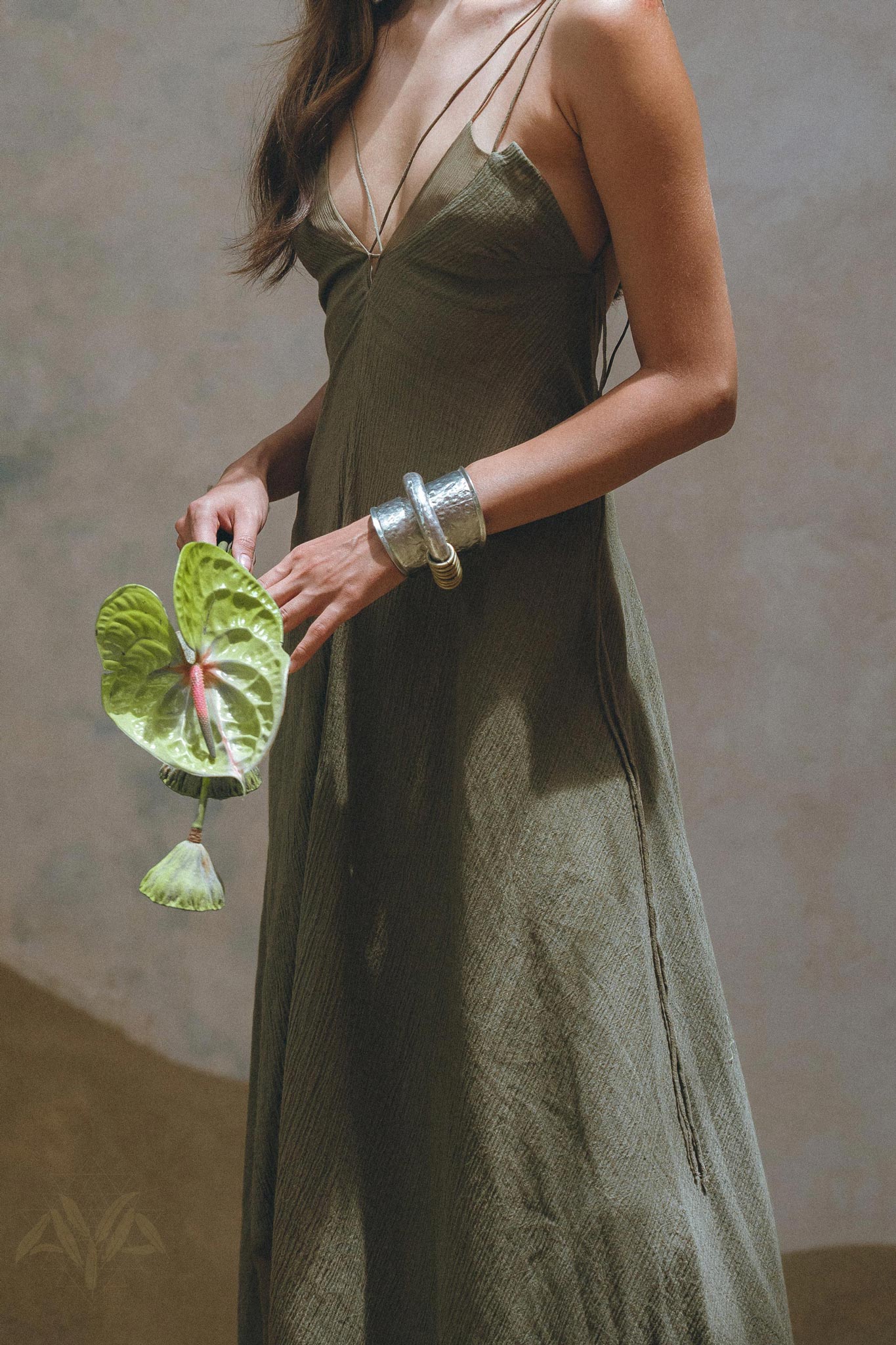 Make a statement and look fabulous in this Sage Green Goddess Dress from Aya Sacred Wear. 