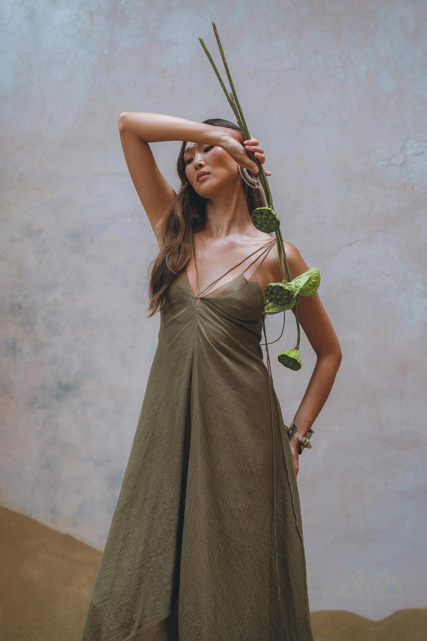 Enhance your wardrobe with Aya Sacred Wear's Sage Green Goddess Dress. 