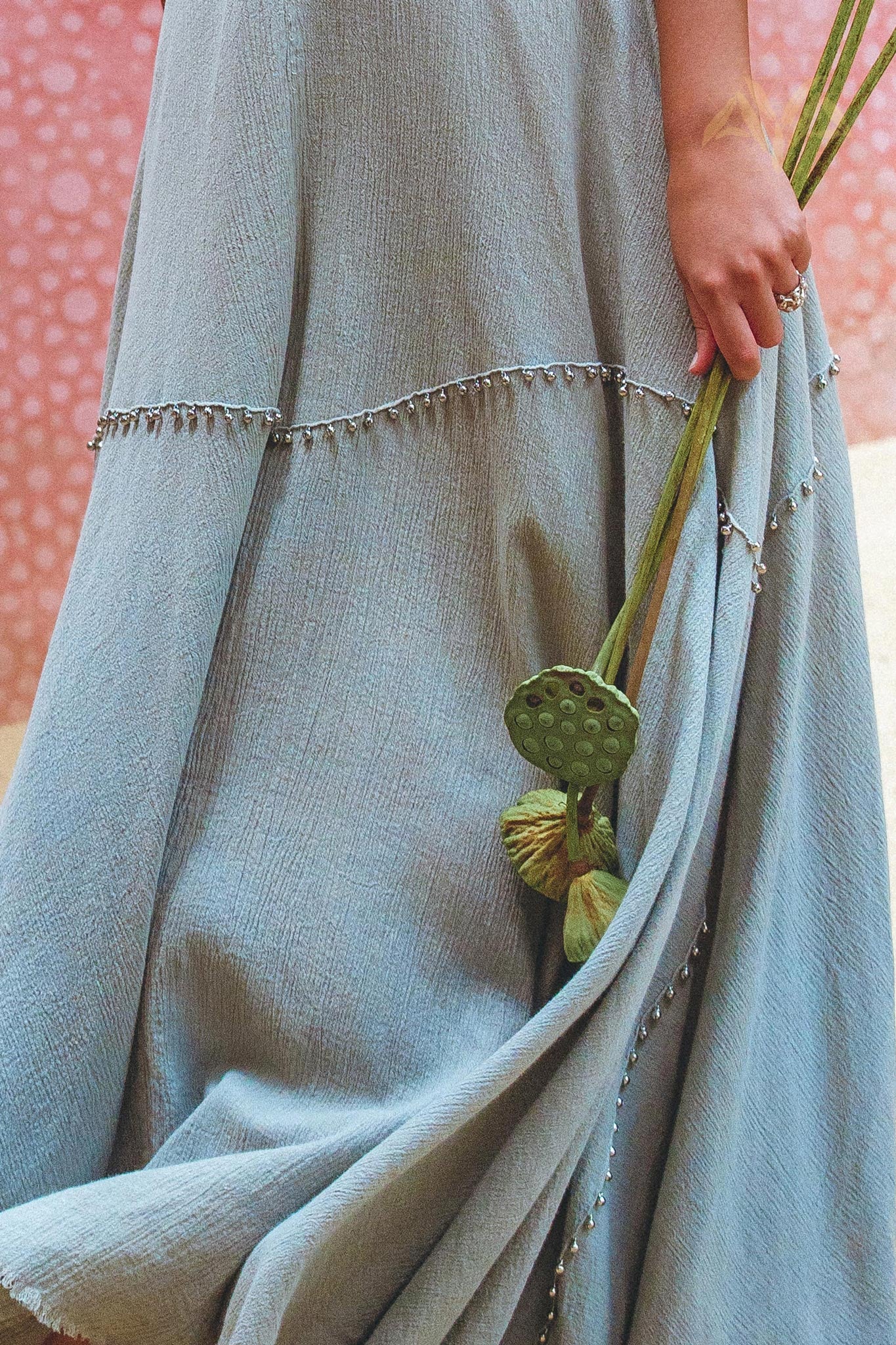 Stand out in the crowd with Aya Sacred Wear's hand embroidered sky blue dress.
